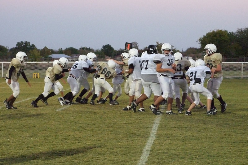 Image: Gladiator defensive line — The Gladiators working hard to defend their goal.