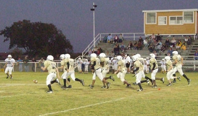 Image: Kicking off — 8th grade Gladiators kick off the second quarter.