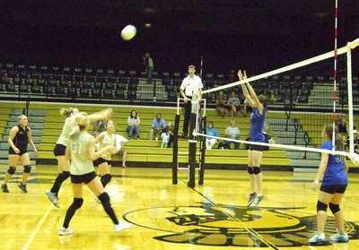 Image: The Lady Bulldogs have to be ready — Casi Jeffords (25) launches a bomb over the net.