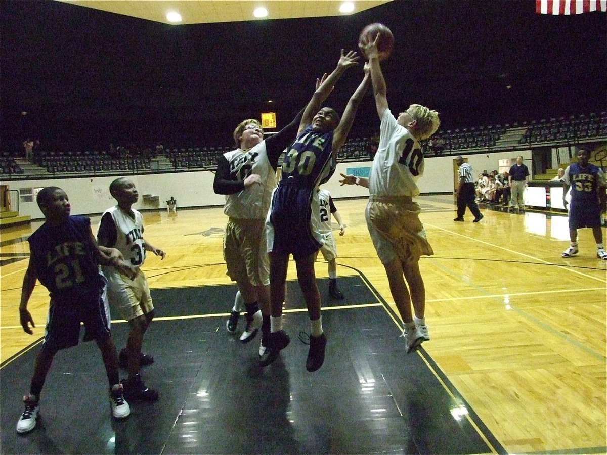 Image: Not in our lane! Tyler Vencill(50) and Cody Boyd(10) block the path  — Tyler Vencill(50) and Cody Boyd(10) deny this Dallas Life player a chance for 2-points.