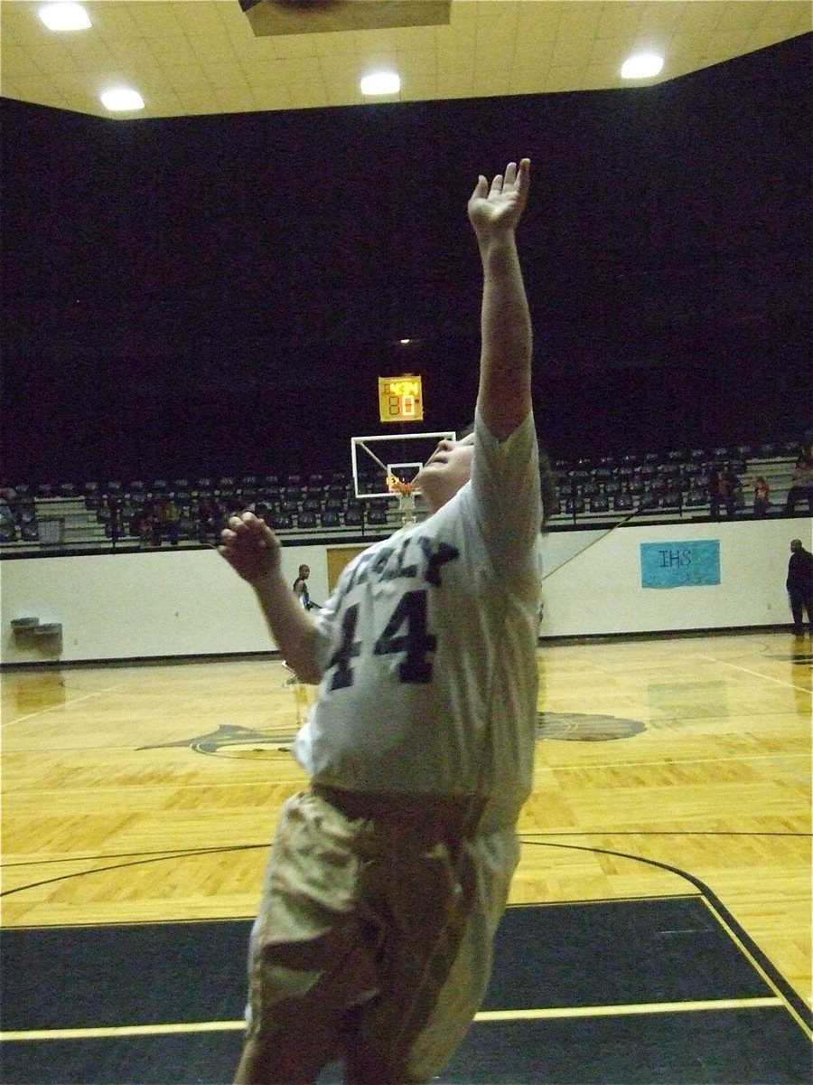 Image: Byers lays it in — John Byers(44) practices layups before the game.