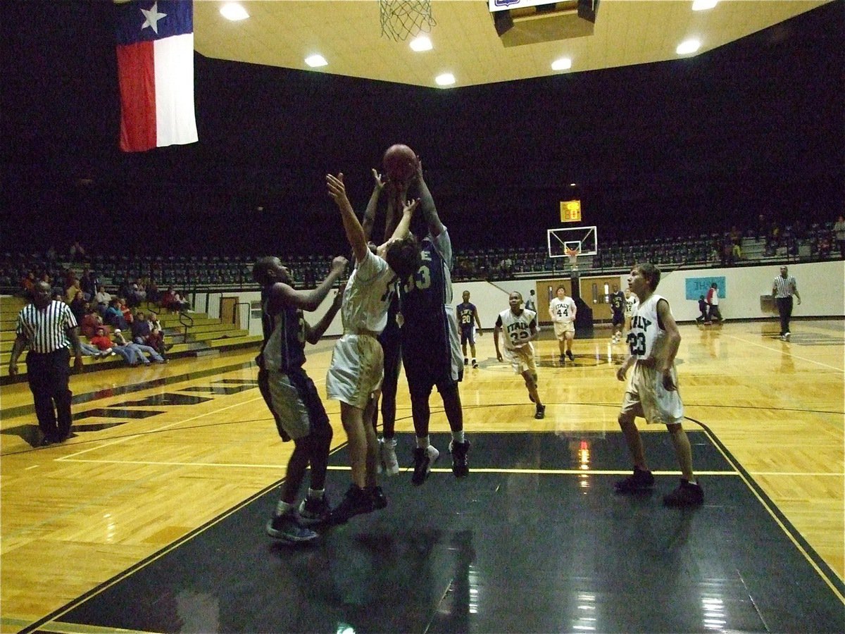 Image: Chace battles — Italy’s Chace McGinnis(13) battles for a rebound against three Dallas Life players but Colton Petrey(23) and Nick Cooper are on their way to help.