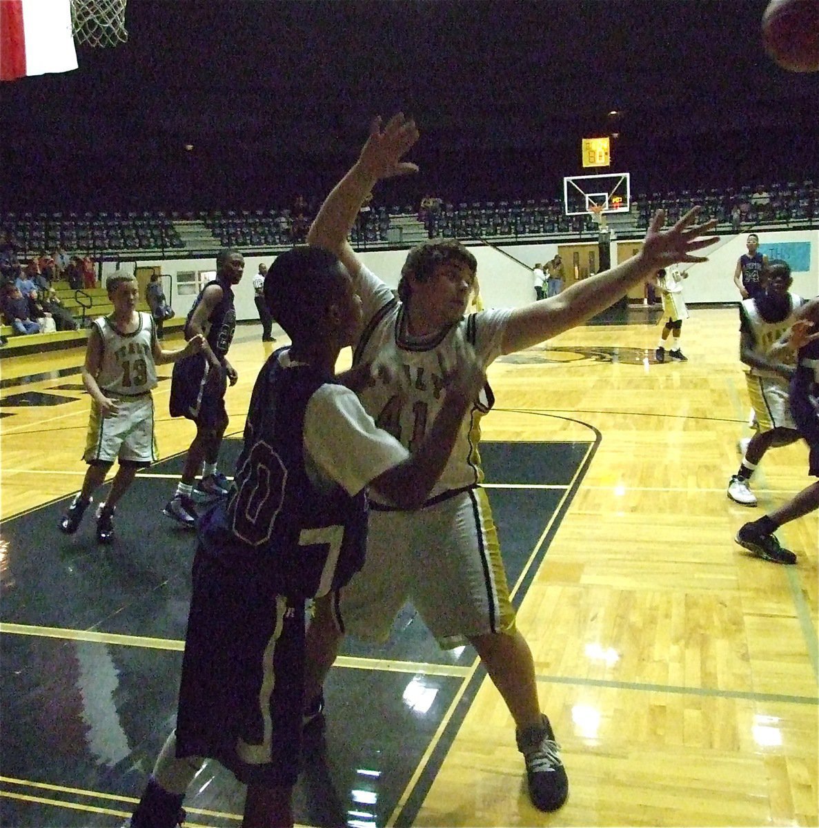 Image: Kevin’s an obstacle — Kevin Roldan(44) pressures the inbound pass while Bailey Walton(13) defends.