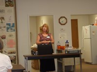 Image: Jeannie Richadson — Jeannie Richardson, Titus Women’s Club of Milford founder, is conducting the meeting.