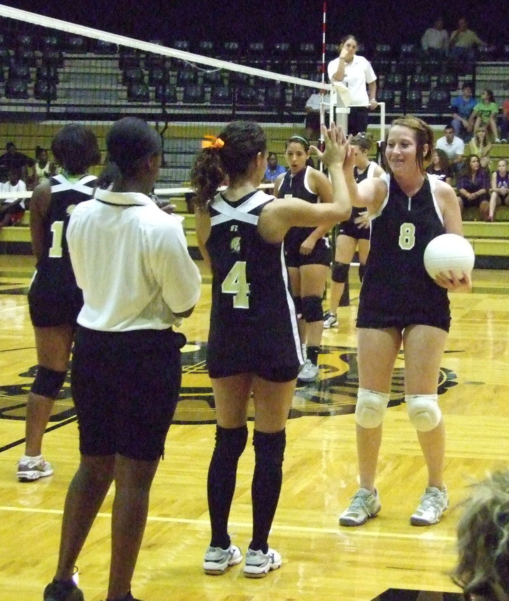 Image: Bring me in — Anna Viers and Bailey Bumpus rotate Tuesday night.