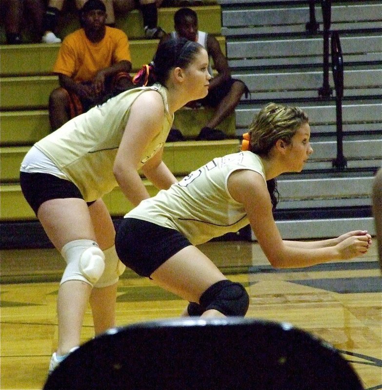 Image: Wanting the win — Italy’s J.V. players Paige Westbrook and Morgan Cockerham are ready to rumble in the first set against Dawson.