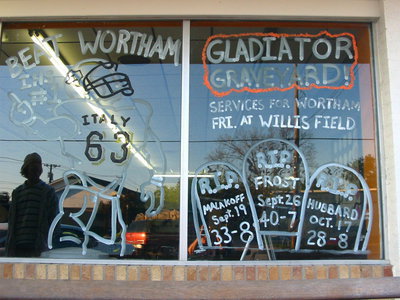 Image: Gladiator Graveyard — Gladiator Graveyard advertises services for Wortham Friday night at Willis Field.