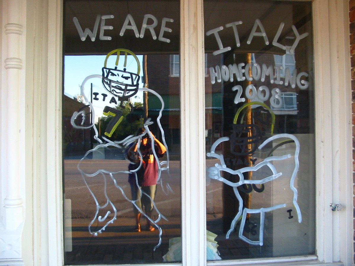 Image: Ronnie Hyles windows — Ronnie Hyles, IHS alumni is a Gladiator supporter.