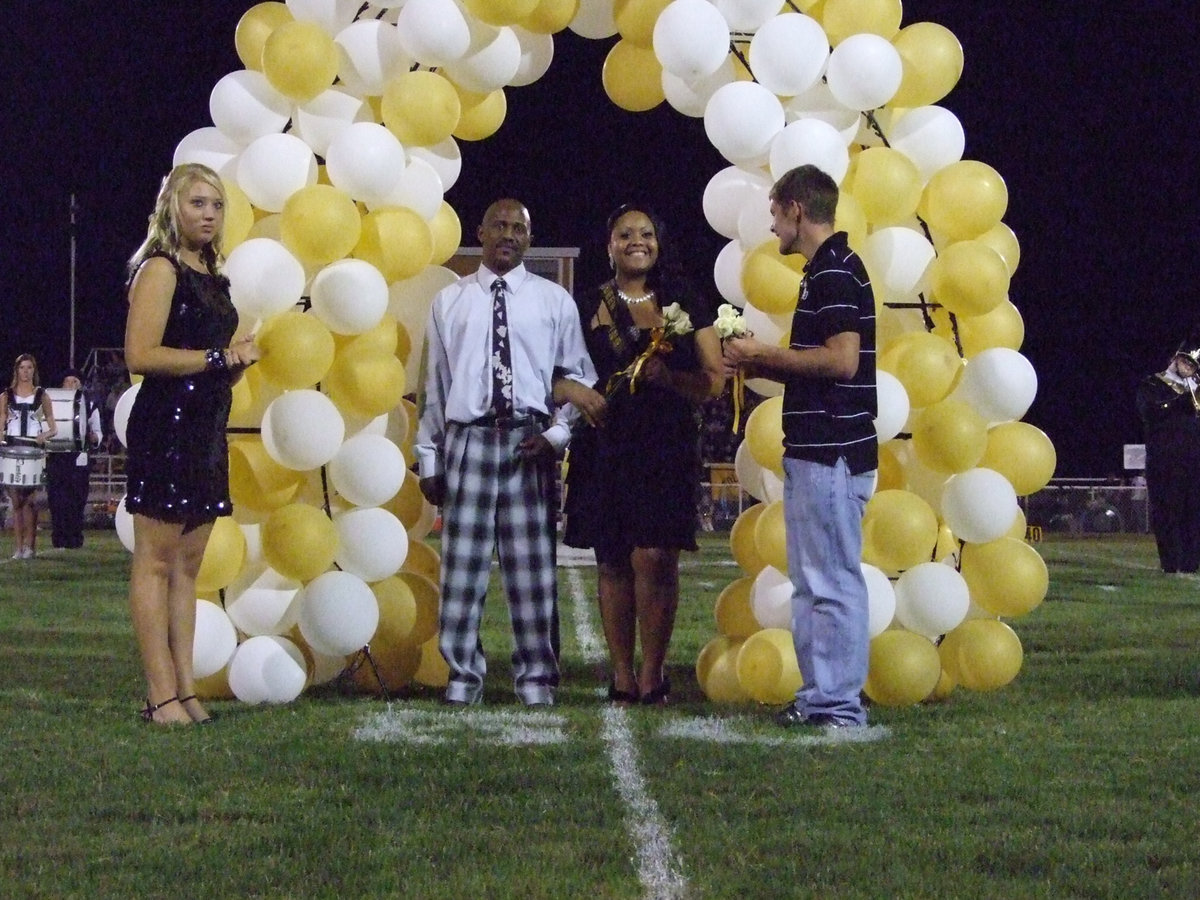 Image: Regal Amber — Amber Mitchell and her escort, Keith Massey.