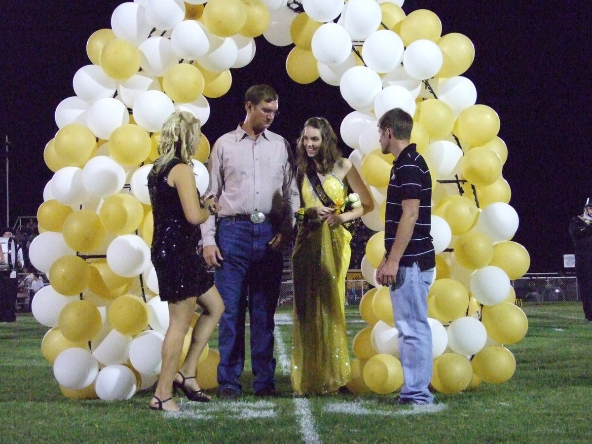 Image: Smithey smiles — Melissa Smithey and her escort, Mike Smithey.