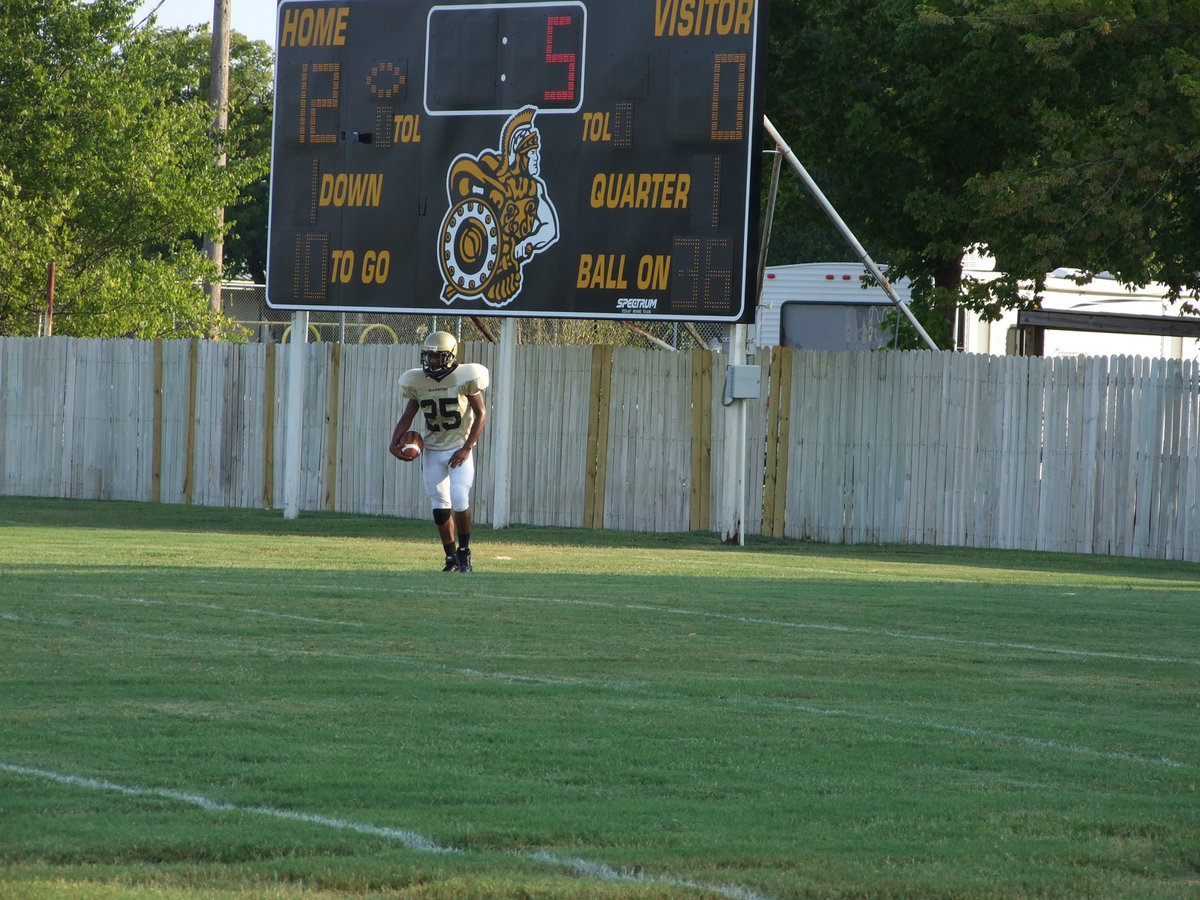 Image: The first of many — Newcomer Mike Clark scores his first touchdown as a Gladiator.