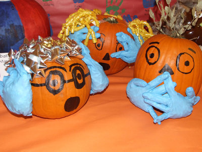 Image: Pumpkins with a message — Hear no evil, see no evils, speak no evil.
