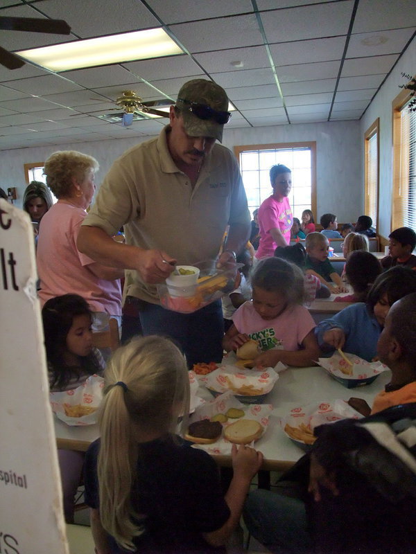 Image: Pickles? Cheese? — Even parents pitched in to help.