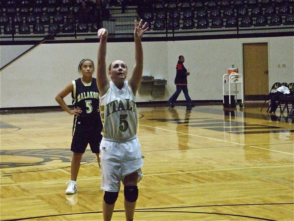 Image: Mary adds energy — Mary puts in a free throw against Malakoff.