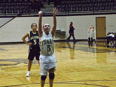 Image: Mary adds energy — Mary puts in a free throw against Malakoff.