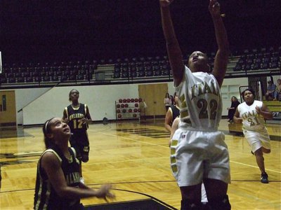 Image: Burkhalter scores — Brianna worked hard inside the paint all game.