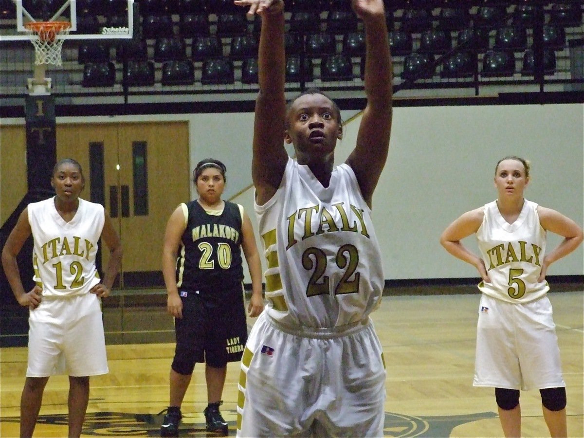 Image: Watching it drop — Brianna Burkhalter(22) drops in the free shot against Malakoff.