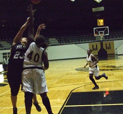 Image: Reed plays “D” — Jimesha Reed(40) defends the the Italy goal against Malakoff.
