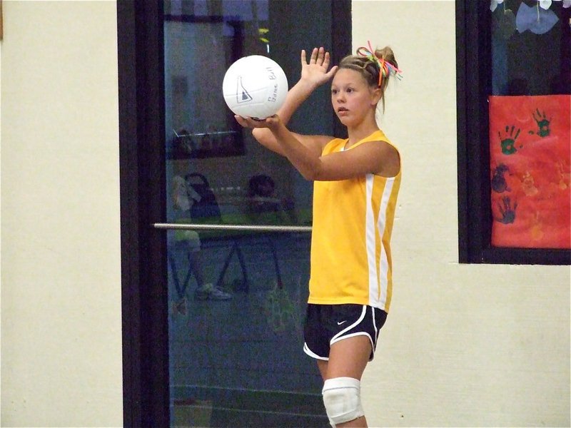 Image: Bailey serves — Bailey Eubank serves against Waxahachie to help Italy win in two sets.