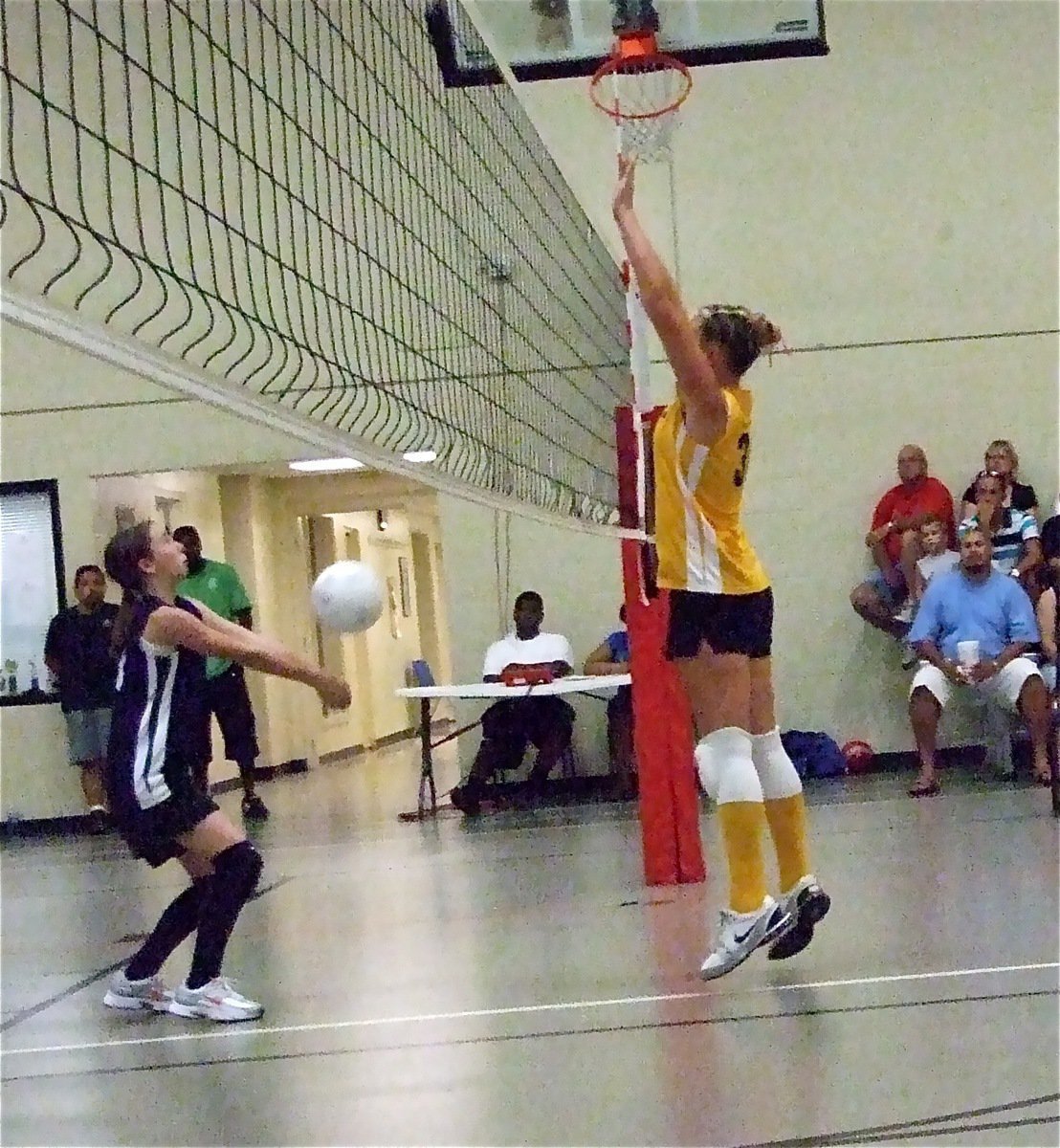 Image: High level of play — Madison Washington gets the block against Waxahachie and gets a point on the board for Italy.