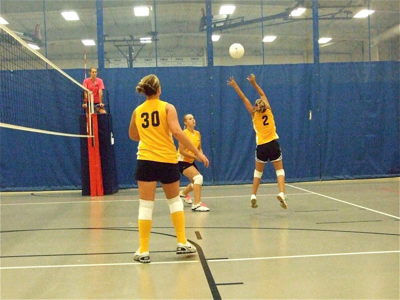 Image: 2 good — Bailey Eubank(2) keeps the ball alive while Madison Washington(30) and Jaclynn Lewis converge on the play. Italy finished as the YMCA’s Volleyball Tournament Runner-Ups.