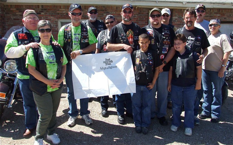 Image: The Southern Cruisers of Ellis County 326 Adopt-a-Highway — Southern Cruisers Riding Club members that participated in the Adopt-a-Highway program on Sunday in Italy were: Back Row Earl Goodwin, Mike Ritchey, Gary McNeely, Gena Litton, Bobby Litton, Shay Krnavek, Scott Spencer, Mark Jones, Barry Guthrie, and Cheryl Palmer. Front Row Donna Goodwin, Jaquay Brown and Dylan Jones.