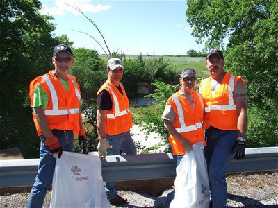 Image: A scenic view — Southern Cruisers’ members Mike Ritchy, Scott Spencer, Cheryl Palmer and Barry Guthrie help keep Ellis County scenic.