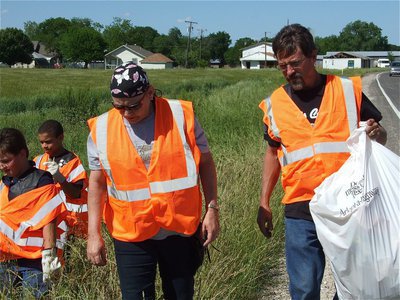 Image: Group effort — Dylan Jones, Jaquay Brown, Gena Litton and Mark Jones cruised the roadside spotting trash along the way.