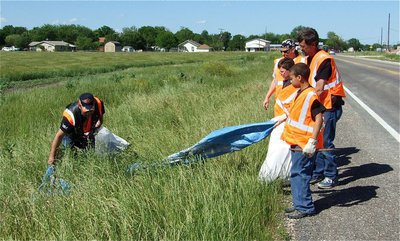 Image: Look what we found — It’s amazing what trash is hidden within the tall grass blades along Hwy 77.