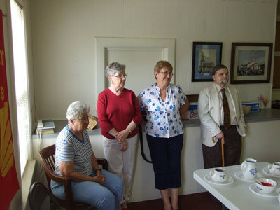 Image: Hostesses with the mostess — The Methodist women seen here are ready to serve the cream (L-R) Jane Reeves, Marilyn Crowell, Connie Reeves and Rev. Tim Thomas.