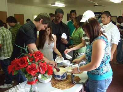Image: Ok, it’s time — After several games, the graduating class of 2010 were ready to eat ice cream.