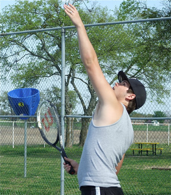 Image: The Smasher — Jonathan “The Smasher” Nash gets ready to serve against the Palmer Buldogs.