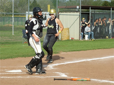 Image: Coming home — Alyssa Richards makes her way home off an RBI by Anna Viers.