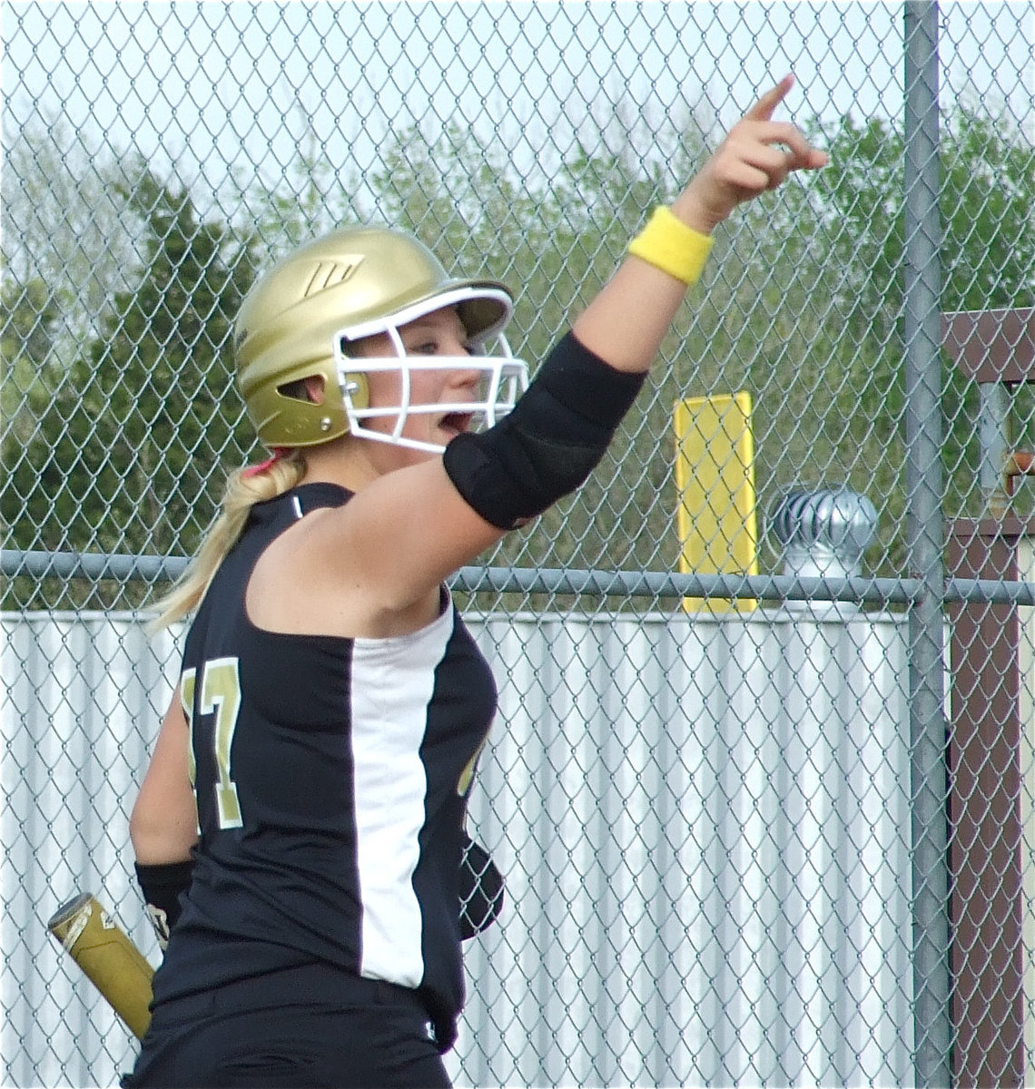 Image: Good job! — Megan Richards shouts praise to one of her teammates for knocking her in for a score.