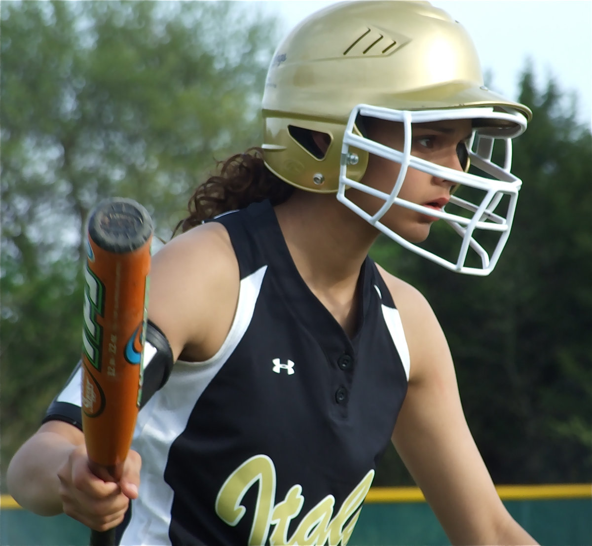 Image: Anna is a hit — Anna Viers steps to the plate and races to first base after she hits another one.