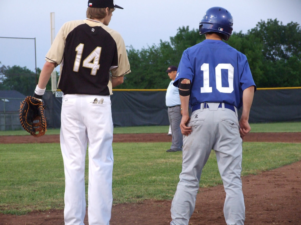 Image: Campbell watches carefully — You can’t get past Colten Campbell on first.