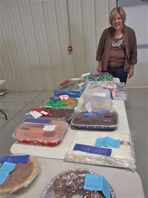 Image: Mrs. Hyles’ all smiles — Ann Hyles displays many of the food items that won ribbons during the Expo. After 39 years of dedicated service to the kids of Italy High School, Mrs. Hyles will be retiring after the school year but not before the kids did so well at the Expo. “Thank you Mrs. Hyles for always being positive and always with a smile.”