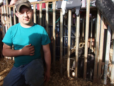 Image: Blake Vega’s first year — Blake showed his pig and won fourth at the Ellis County Expo last week.