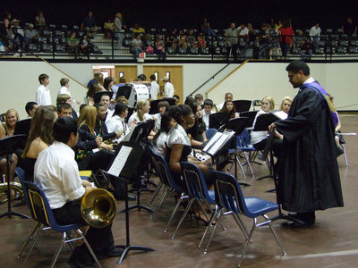 Image: Pomp and Circumstance — Mr. Perez and the wonderful IHS band gear up for the seniors’ last walk.