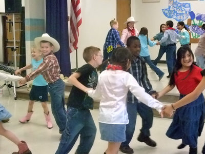 Image: Let’s Square Dance — These second graders know how to dance.