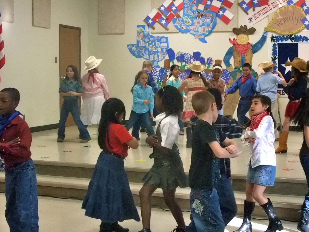 Image: Do-Si-Do — These second graders really got into their do-si-do.