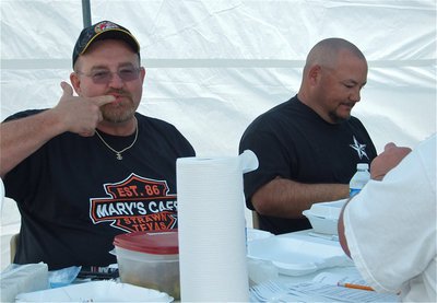 Image: Time of their lives — Robert Sollers and Craig Bales were as happy as two judges in a BBQ Cook-off could be.