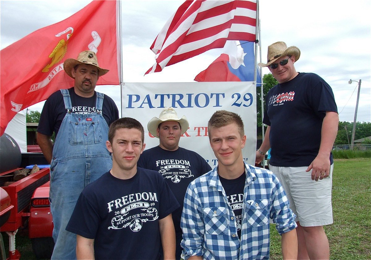 Image: Patriot 29 — Members of the Patriot 29 BBQ team from both Red Oak and Cedar Creek, Texas are: Back row*: Donnie Mrozinski, Chris Futrell and Danny Roland. Front row: Josh Mrozinski and Ben Leath. The name Patriot 29 is in memory of fallen soldier Ryan Patrick Green, Roland’s cousin. The Patriot 29 Troop Support Fund is a 501©(3) non-profit corporation. Visit the Patriot 29 website and Email:patriot29fund@gmail.com to get involved.