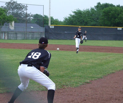 Image: Cole and Kyle — Warming up between innings, Cole Hopkins and Kyle Jackson play catch.