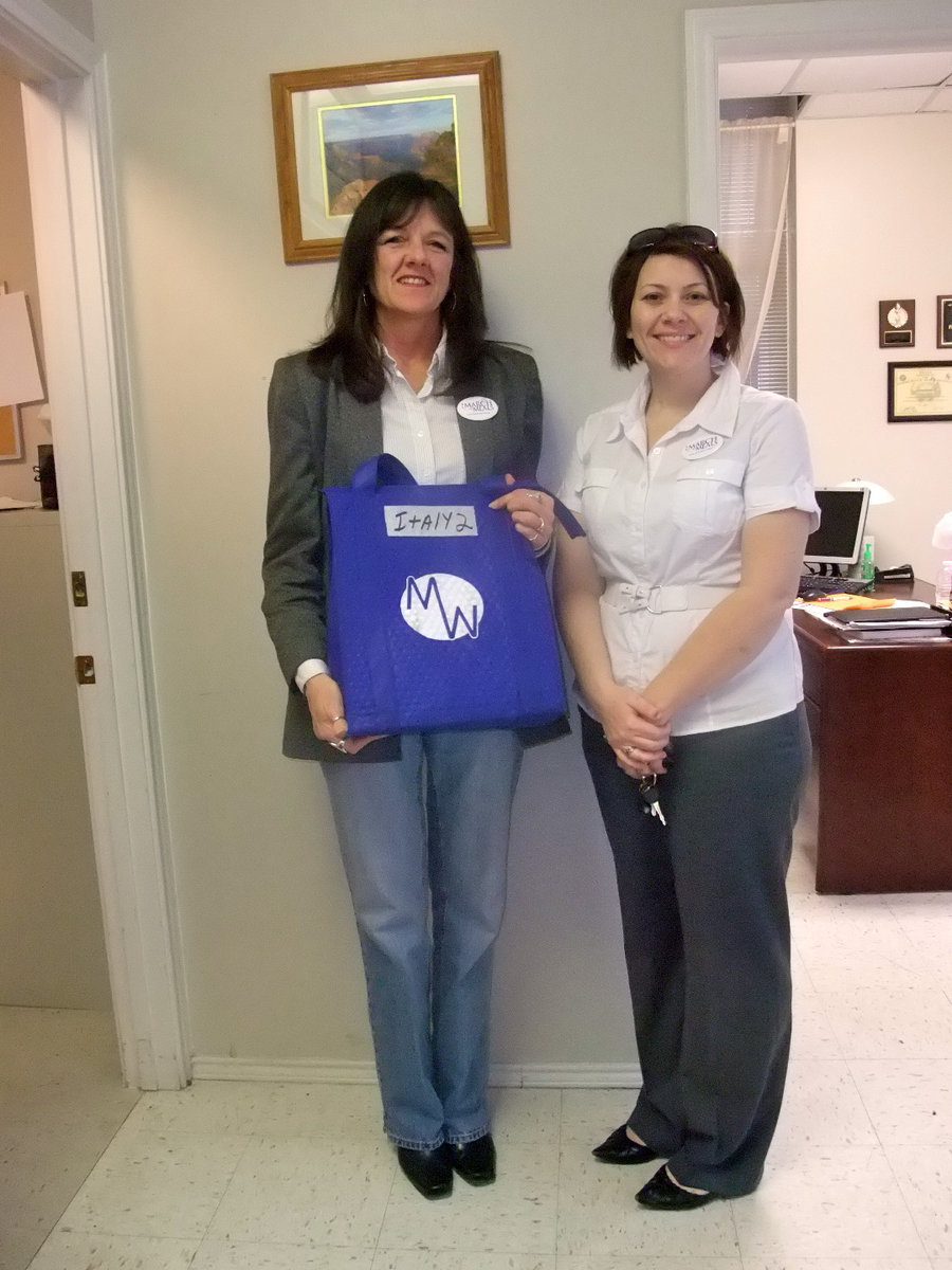 Image: Teri Murdock &amp; Meals on Wheels Representative — Teri Murdock (Italy City Administrator) is ready to deliver meals to the residents of Italy.