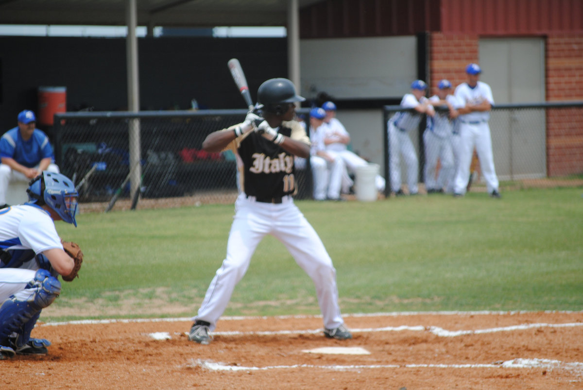 Image: Jasenio at bat — Jasenio Anderson steps into the pitch.