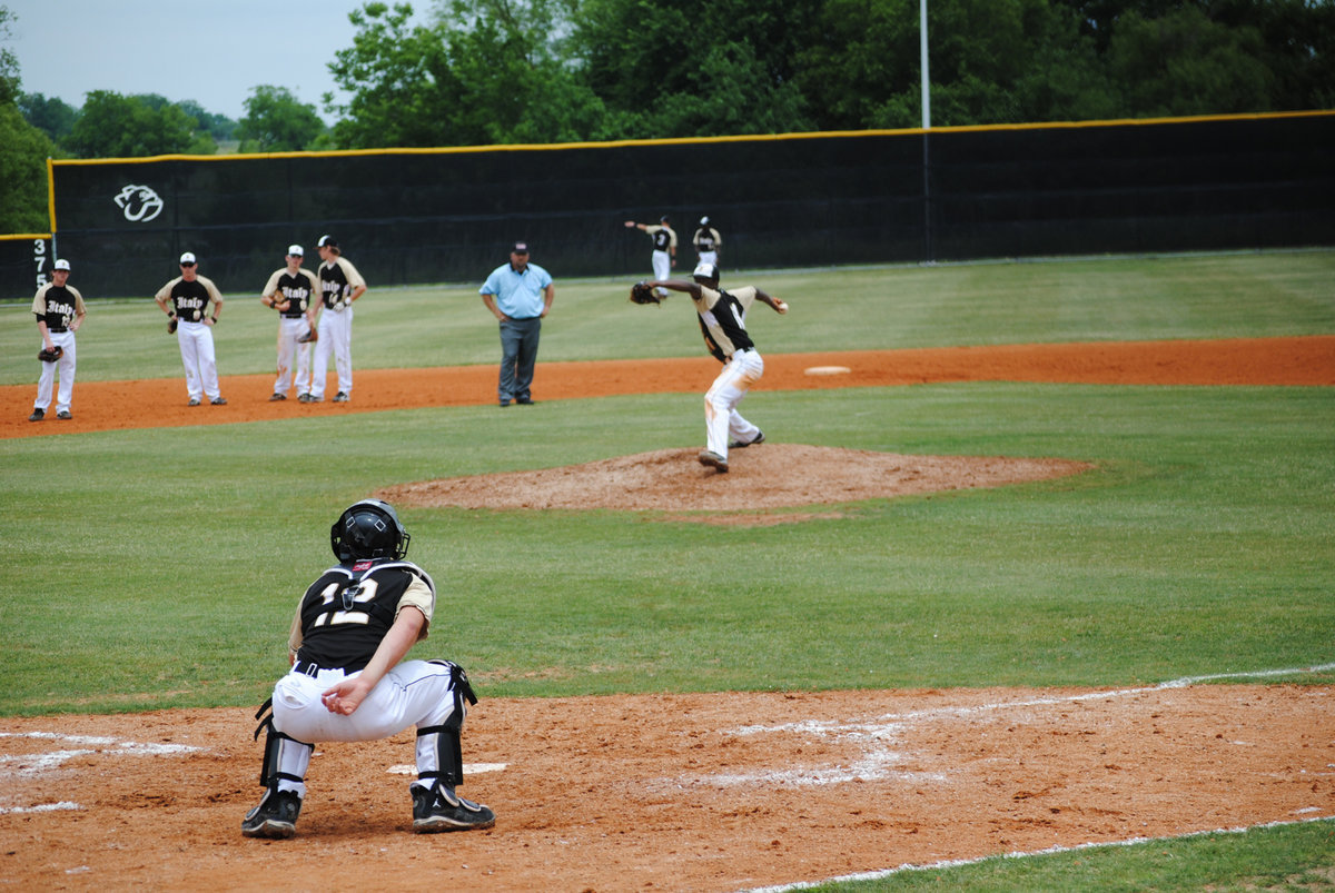 Image: Jasenio gets warm — Jasenio Anderson is only a junior but has been pitching for years.