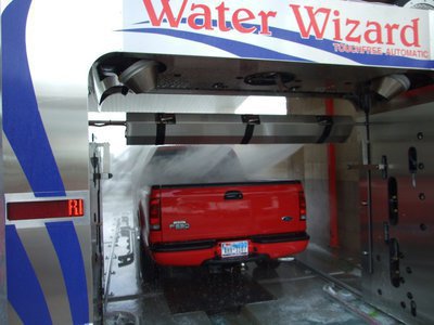 Image: Get rinsed — From bottom to top and front to back, the Water Wizard 2.0 will leave your vehicle sparkling. The vehicles get rinsed a few times during the Super Wash.