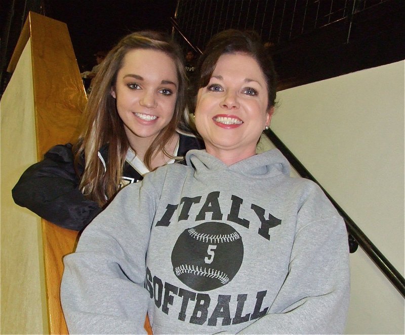 Image: Drew and Andrea — Drew Windham cheered while her Mom, Italy Volleyball/Softball Coach Andrea Windham, helped keep the Italy Invitational Basketball Tournament running smooth.