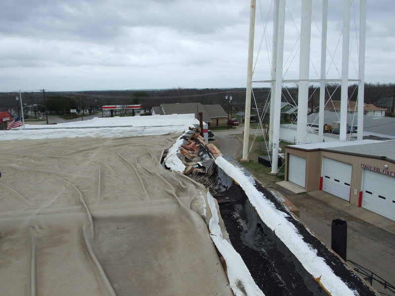 Image: Roof Membrane — Roof membrane was added to this building in 2004.  The wall has pulled away from membrane.
